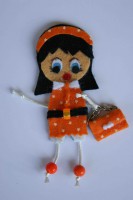 Ref 001   Nuevo broche muñeca en tonos naranjas