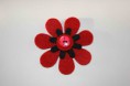 Ref 3   Broche flor con detalle de reloj en colores rojo y negro
