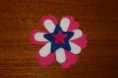 Ref 18    Broche flor con doble estrella