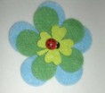 Ref 030 Broche flor con mariquita central
